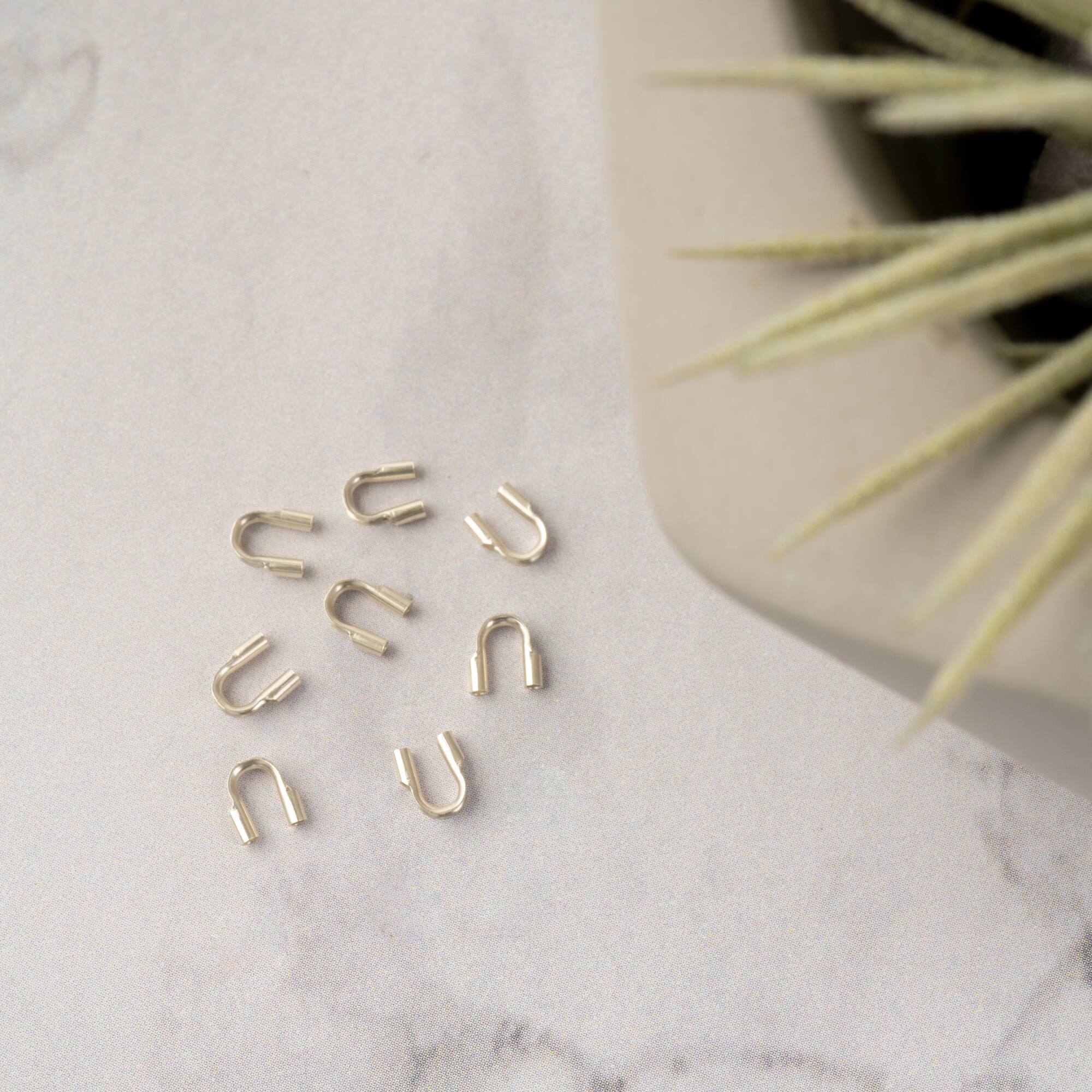 6 Packs: 8 ct. (48 total) 0.031'' Sterling Silver Wire Guards by Bead Landing™
